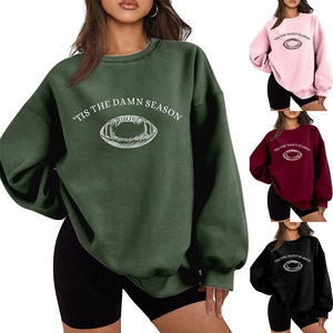 Detail view of TIS THE DAMN SEASON oversized fleece sweatshirts in multiple colors