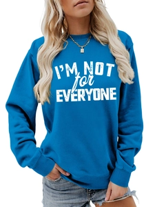 Close-up of I'M NOT FOR EVERYONE white printed text on blue cotton sweatshirt