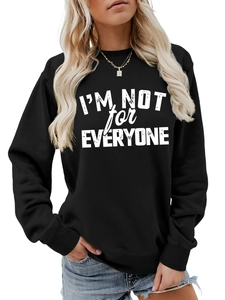 Detail of black sweatshirt with white I'M NOT FOR EVERYONE slogan and ribbed cuffs
