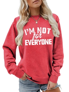 Detail of brick red sweatshirt featuring white I'M NOT FOR EVERYONE print and ribbed cuffs