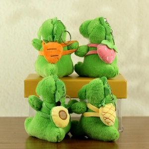 Cute green dinosaur plush keychains with fruit backpacks including strawberry and pineapple