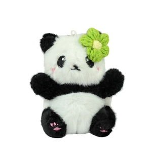 Pendentif peluche panda mignon avec fleur tricotée verte et broderie sur fond blanc