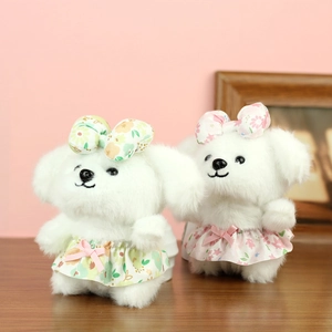 Cute plush puppy toy in floral dress, soft white stuffed dog doll with floral bow tie