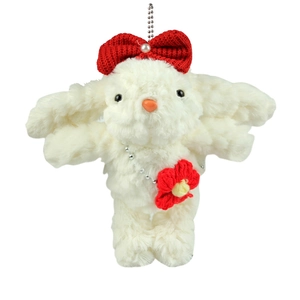 Portachiavi con coniglio di peluche bianco con fiocco rosso e perla su sfondo bianco