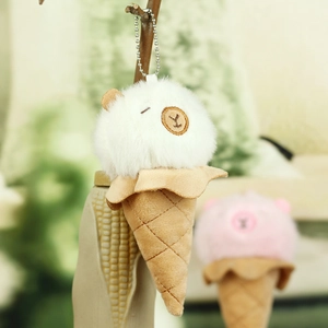 Close-up of cute plush capybara ice cream keychain with detailed quilted cone texture