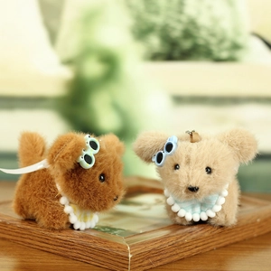 Cute plush puppy keychains with sunglasses and polka dot scarves in a vintage frame