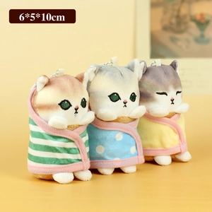 Three cute plush cat keychains wrapped in colorful towels including ginger and grey cats