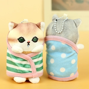Front and back detail of plush cat charms with striped and polka dot shark towels