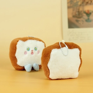 Detail of cute plush toast charm showing front and back with soft beaded chain