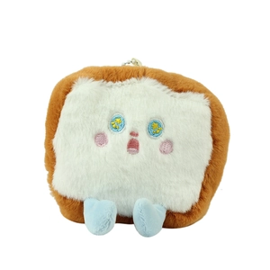 Cute toast bread plush keychain featuring blue eyes and soft embroidery on white background