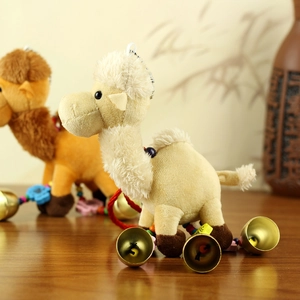 Close-up of cute plush camel keychains featuring colorful beads and golden metal bells
