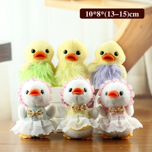 Plush duck keychains featuring colorful fur and lace dresses with sun hats
