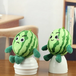 Cute watermelon plush keychains with smiling and angry expressions on white pedestals