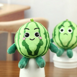 Detailed close-up of cute plush watermelon keychain with soft fabric and embroidered face