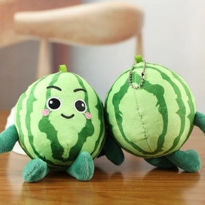 Detail of plush watermelon keychains with cute embroidery and metal bead chains