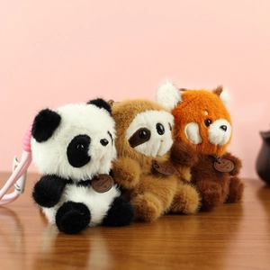 Tre ciondoli per borsa in peluche di panda e bradipo con cinturini intrecciati rosa