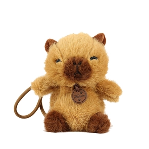 Ciondolo in peluche Capybara con pelliccia zenzero ed elegante etichetta in cuoio