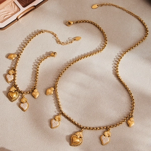 Parure bijoux soleil et lune en acier inoxydable doré avec pendentifs cœur et zircons