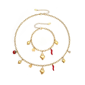 Gold stainless steel jewelry set with heart, ladybug, and chili charms on oval link chain