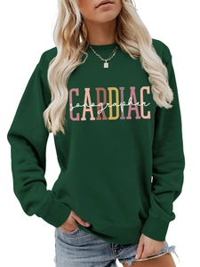 Detail showing CARDIAC sonographer letter print on dark green crewneck sweatshirt