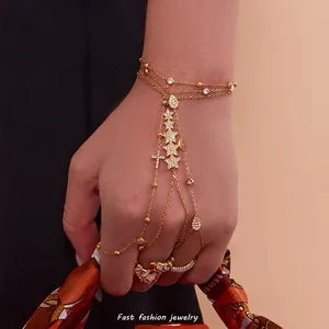 Gold plated stainless steel finger chain bracelet with zircon stars and cross pendant