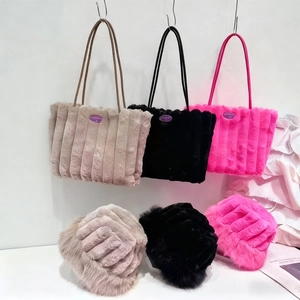 Matching faux fur tote bag and bucket hat set with vertical striped texture in neutral tones