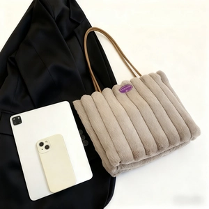 Winter faux fur tote bag with vertical quilting and large capacity for a tablet