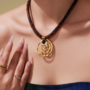 Golden spiral heart pendant necklace with leopard print silk ribbon and pearl accents