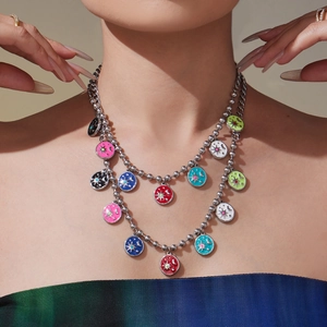 Double-layered beaded necklace with colorful enamel star and moon pendants in silver steel