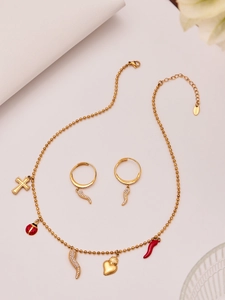 Detailed view of gold stainless steel jewelry set with colorful enamel chili and heart charms