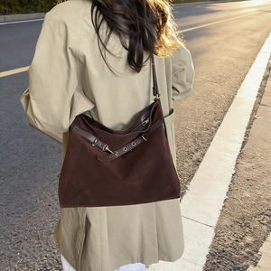 Retro deep brown suede tote bag for women showing a large capacity slouchy silhouette