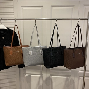 Set of four stylish leopard print tote bags in brown, grey, black and dark coffee colors
