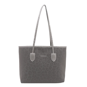 Chic grey leopard print tote bag with thin straps and Fashion text on a white background