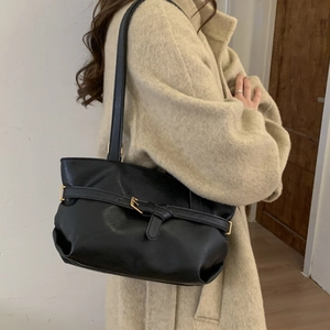 Classic black PU leather tote bag with gold buckle strap detail and long shoulder handle