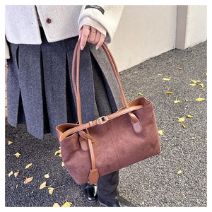 Deep brown suede tote bag details shown with autumn lifestyle commute fashion outfit