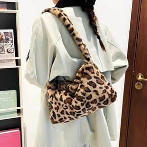 Trendy leopard print faux fur shoulder bag for women styled with a winter coat