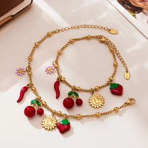 Chaîne en acier plaqué or 18K avec breloques colorées en émail fruits et fleurs