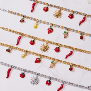 Gold plated stainless steel beaded bracelets with fruit and sun charms set