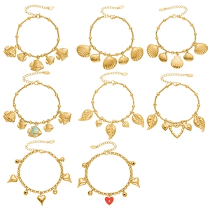 8-piece gold stainless steel bracelet set with sea shells fish and heart charms