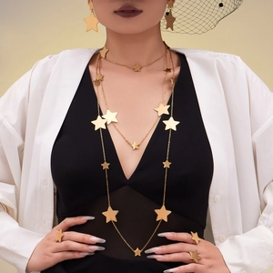 18k gold plated star jewelry set featuring oversized earrings and layered necklaces