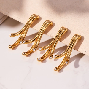 Lot de quatre barrettes dorées en forme de branche avec strass ronds étincelants