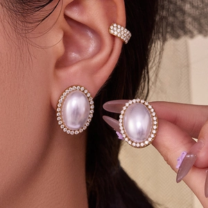 Gold oval pearl earrings with zircon halo and matching ear cuff set for women