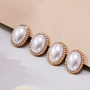 Vintage gold oval pearl earrings with sparkling crystal border for women's jewelry