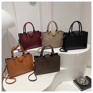 Various colors of stylish large capacity commuter handbags with gold hardware detail