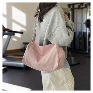 Pink waterproof nylon fitness bag with wet dry separation and adjustable shoulder strap