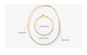 Detail of 18K gold plated herringbone chain necklace and bracelet set with cubic zirconia