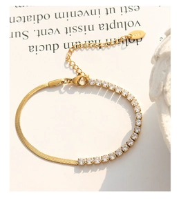 Detail of gold-plated K18 lobster clasp on flat snake and cubic zirconia tennis bracelet