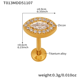 Detailed view of gold titanium alloy labret stud with marquise zircon flower design