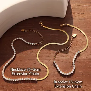 Gold plated herringbone chain necklace and bracelet set with cubic zirconia stones