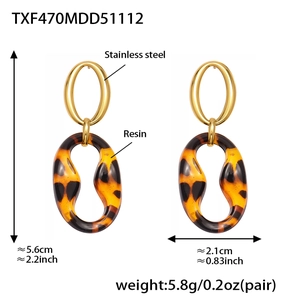 Detail view of leopard resin earrings with stainless steel size and weight specifications